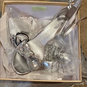Michael Kors Glittering Silver Bow Heels also in Black. Sexy & sophisticated!